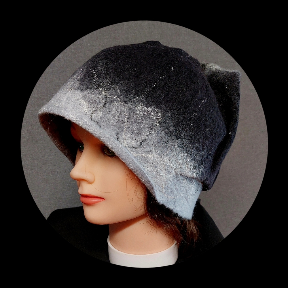 Cute, funky  hat, is light weight,  durable and warm. Hand made.